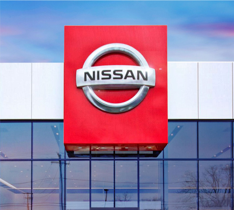 Nissan logo on exterior of dealership