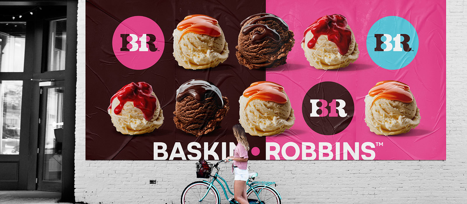Biker looking at Baskin-Robbins outdoor signage