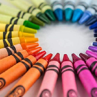 Circle of crayons of different colors