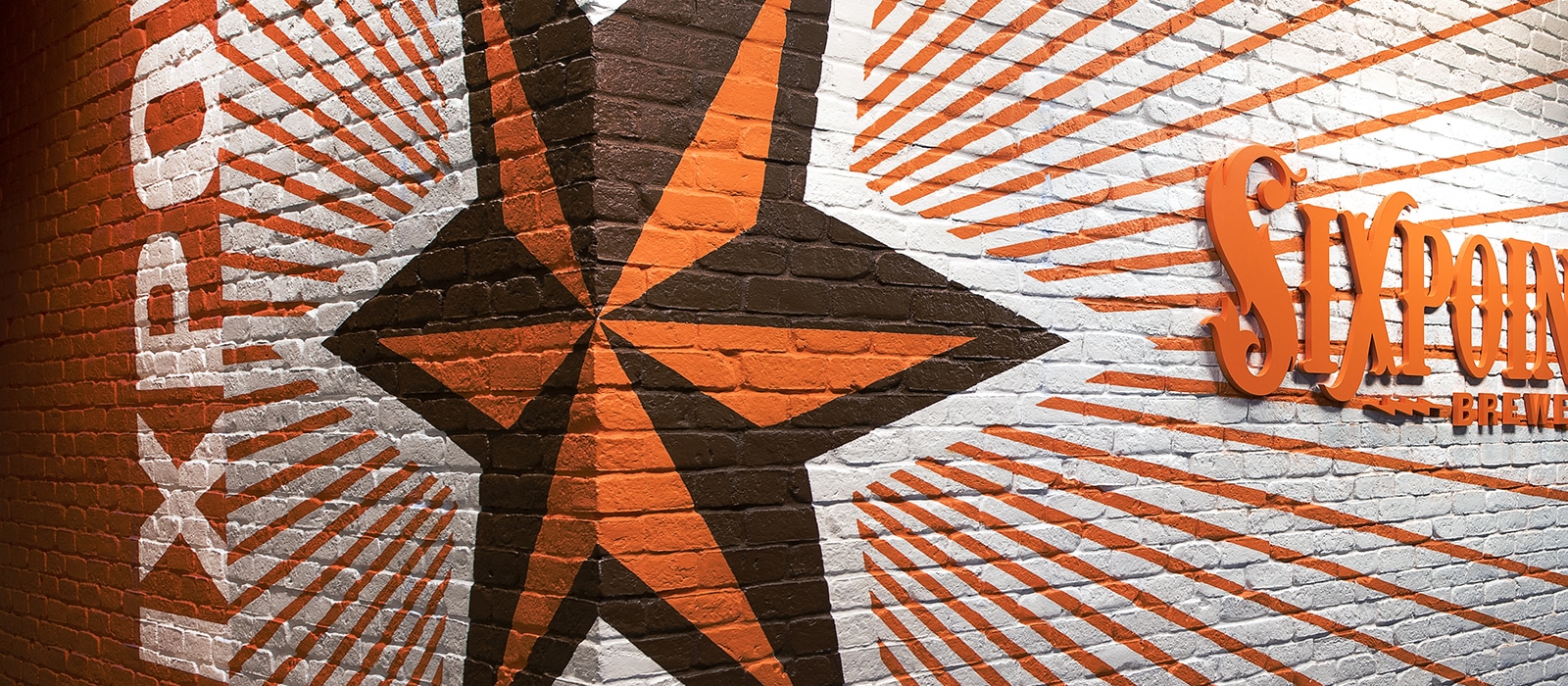 Sixpoint Brewery, six point star on brick wall.